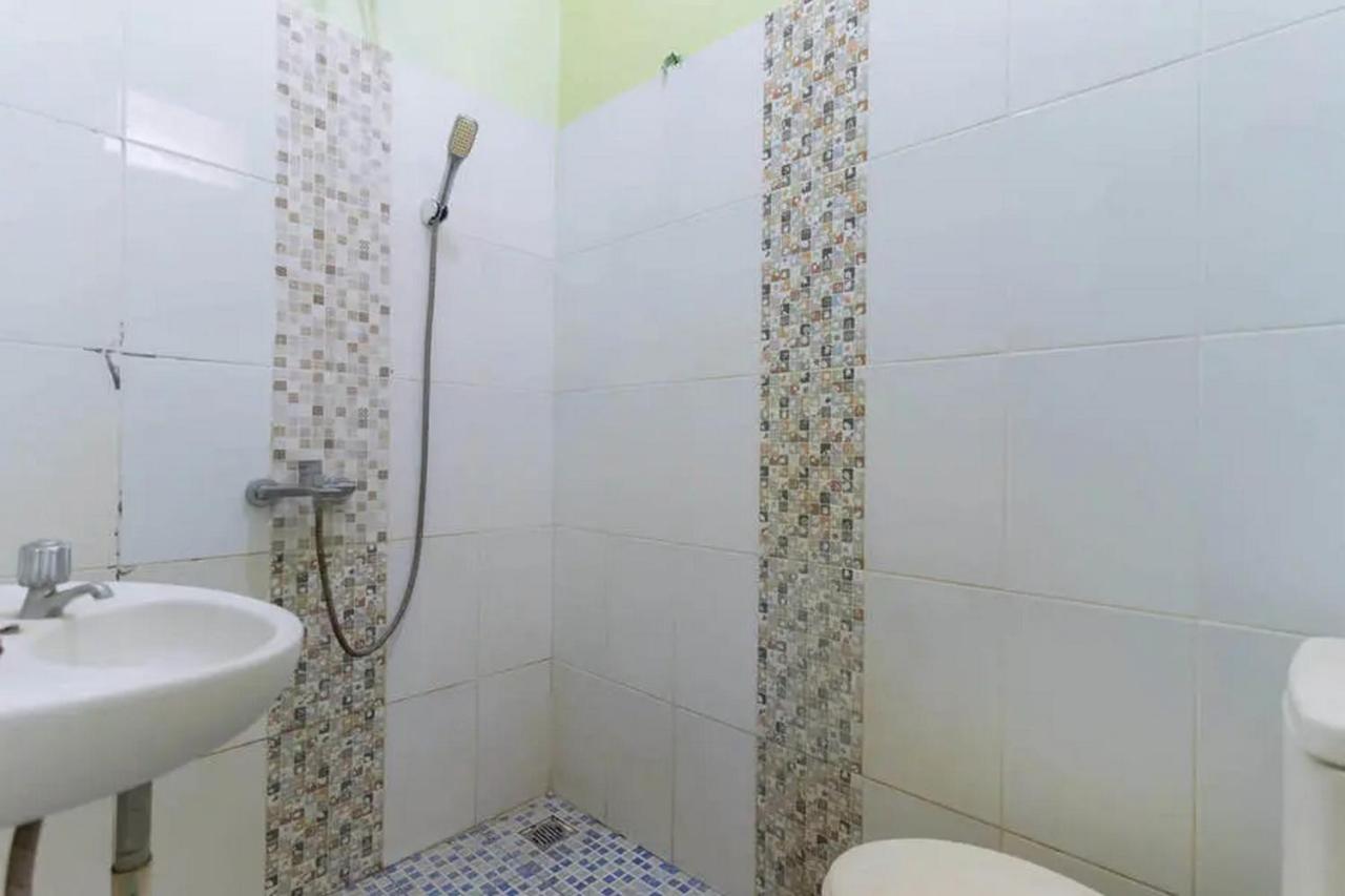 Hotel Kostawira Syariah Bintaro Mitra Reddoorz Mencil Zewnętrze zdjęcie